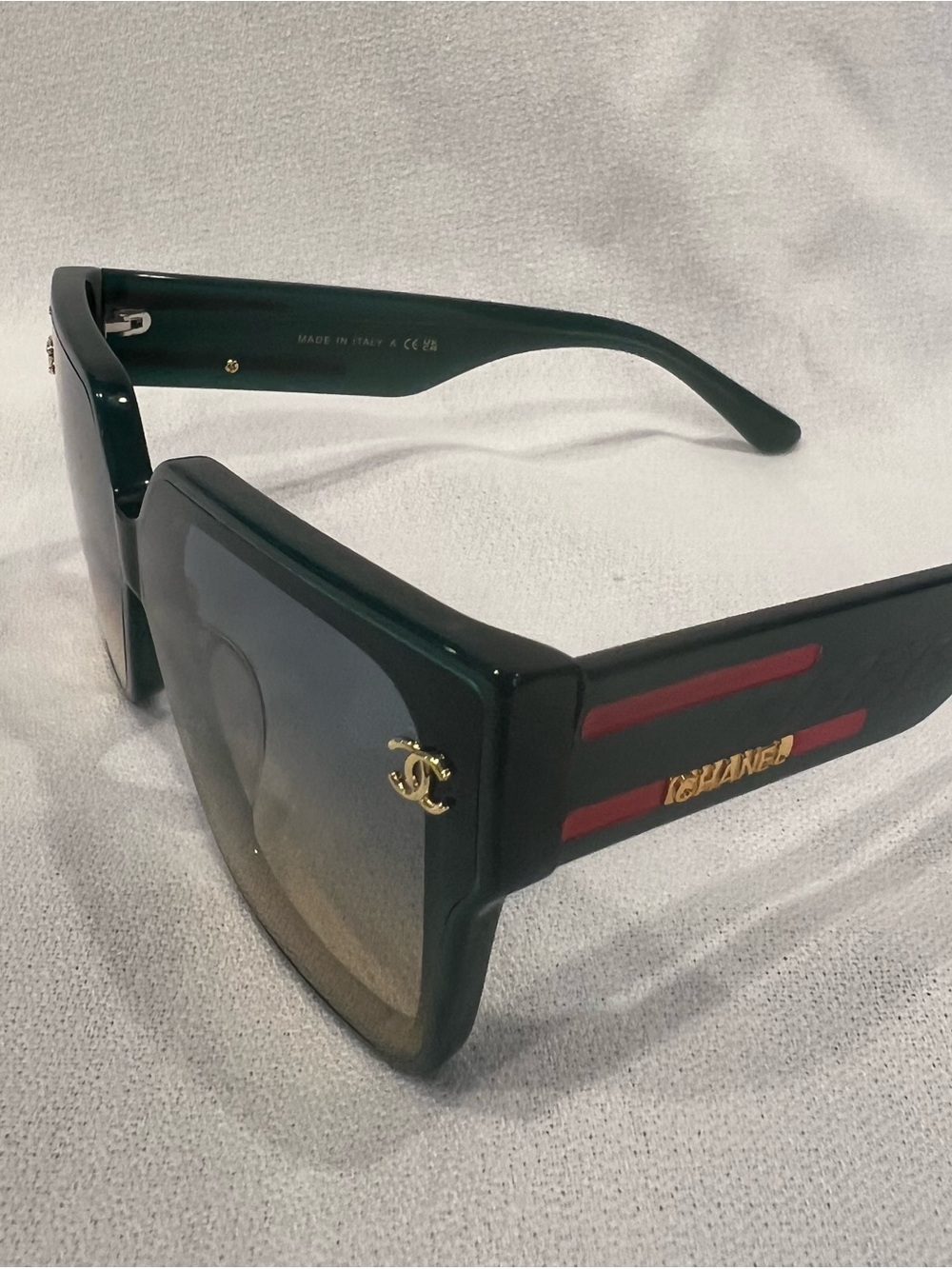 CHANEL Black Square Sunglasses with Red Stripe and Gold Logo